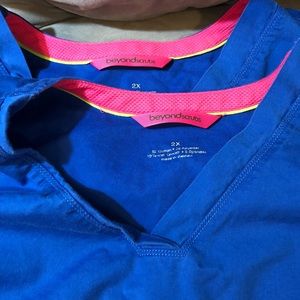 Set of two blue scrub tops size 2X